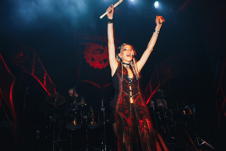 MINSK, BELARUS.September 1 , 2017 Rock band performs in a nightclub The girl shows the performance on stageのeditorial素材