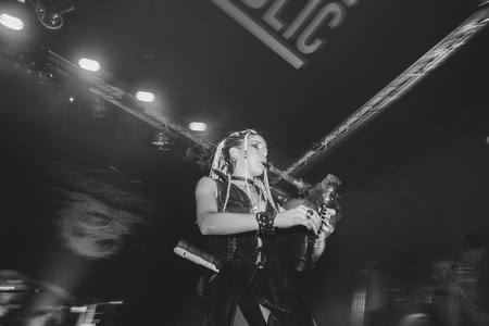 MINSK, BELARUS.September 1 , 2017 Rock band performs in a nightclub The girl shows the performance on stageのeditorial素材