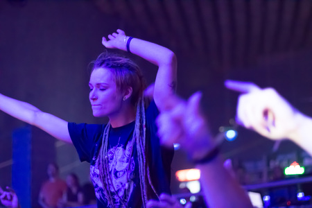 MINSK, BELARUS.September 1 , 2017 Rock band performs in a nightclub A group of people watching a rock band performanceのeditorial素材