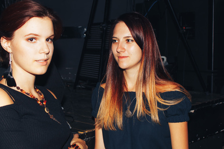 MINSK, BELARUS.September 1 , 2017 Two girls talking in the clubのeditorial素材