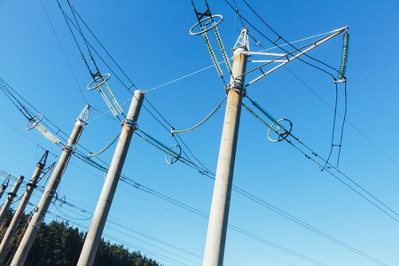 Power transmission line on high voltage post.