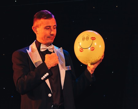 MINSK, BELARUS November 4 2017 International Illusion Festival MAGIC 2017 Male magician shows air balloonのeditorial素材