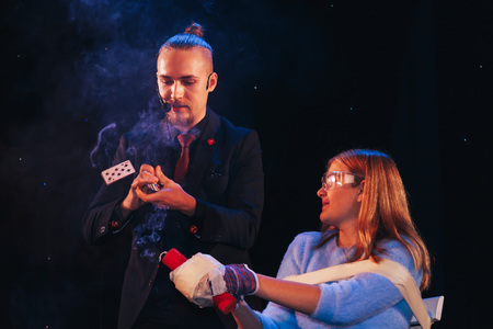 MINSK, BELARUS November 4 2017 International Illusion Festival MAGIC 2017 A young magician takes an...