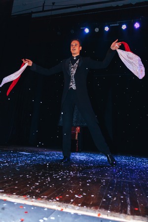 MINSK, BELARUS November 4 2017 International Illusion Festival MAGIC 2017 A male magician shows a show with scarvesのeditorial素材