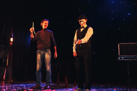 MINSK, BELARUS November 4 2017 International Illusion Festival MAGIC 2017 Male magician and assistant shows stage performanceのeditorial素材
