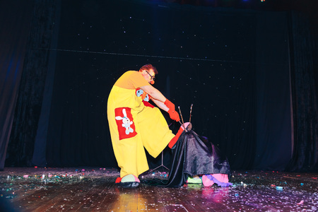 MINSK, BELARUS November 4 2017 International Illusion Festival MAGIC 2017 A man in a clown suit...
