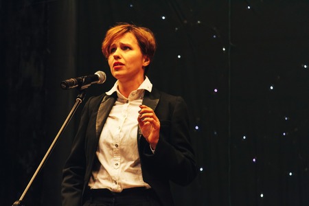 MINSK, BELARUS November 4 2017 International Illusion Festival MAGIC 2017 Seminar A woman speaks into a microphone on stageのeditorial素材