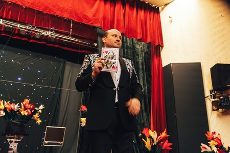 MINSK, BELARUS November 4 2017 International Illusion Festival MAGIC 2017 A man on stage shows objects for tricksのeditorial素材