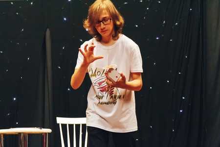 MINSK, BELARUS November 4 2017 International Illusion Festival MAGIC 2017 Seminar Young man shows...
