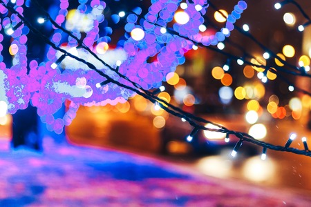 New year garlands near the road Blurred backgroundの写真素材