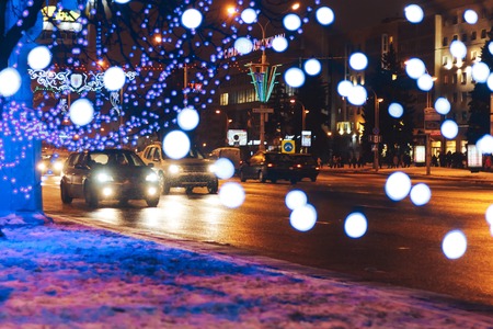 New year garlands near the road Blurred backgroundの写真素材
