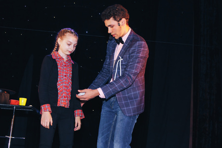MINSK, BELARUS November 5 2017 International Illusion Festival MAGIC 2017 Male magician shows a show...