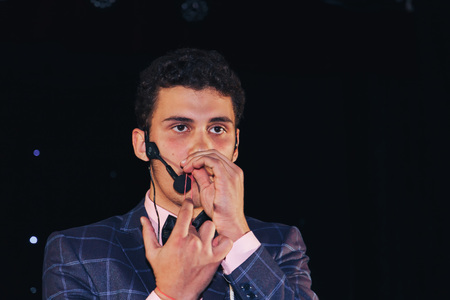 MINSK, BELARUS November 5 2017 International Illusion Festival MAGIC 2017 A young magician shows the...
