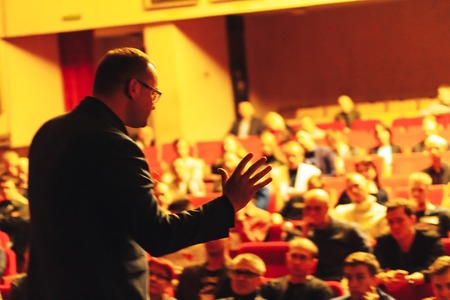 MINSK, BELARUS November 5 2017 International Illusion Festival MAGIC 2017 Seminar The man tells from the stage in front of the audienceのeditorial素材