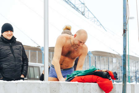 Minsk Belarus January 21, 2018 Swimming pool for winter The man undressed in the winter outdoorsのeditorial素材