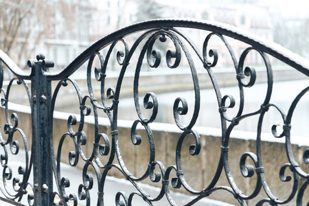 Forged fence fence on the river bankの写真素材