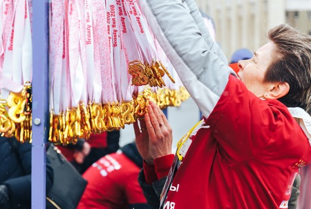 Minsk, Belarus. March 8, 2018 Women's Race Public action Women against violence Women hang medals by March 8のeditorial素材