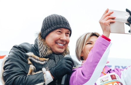 Minsk, Belarus. March 8, 2018 Women's Race Public action Women against violence A man with a microphone and a girl make a salfiのeditorial素材