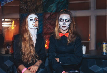 October 28-29, 2017 Minsk Belarus Art space Top Party dedicated to the holiday HALLOWEEN Two girls in suits and make-up are in a nightclubのeditorial素材