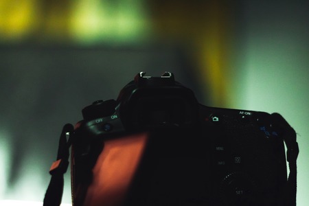 DSLR camera when shooting in the dark Multicolored reflections