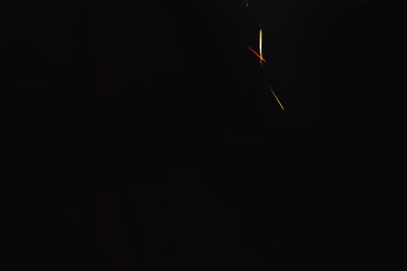 Glare from the lighting device in the dark in the studioの写真素材