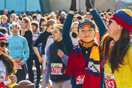 March 8, 2019 Minsk Belarus Women's Day Race on March 8 Laughing athletes do warm-up to the music before the raceのeditorial素材
