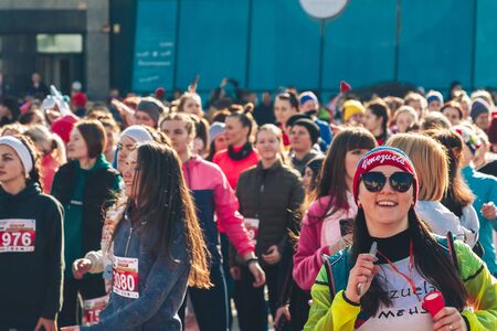 March 8, 2019 Minsk Belarus Women's Day Race on March 8 Beautiful girl sings a song on the street...