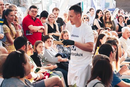 June 1, 2019 Minsk Belarus Public demonstration of cooking on the street Male cook offers cooked...