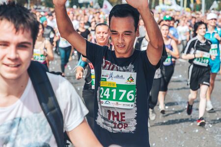 September 9, 2018 Minsk Belarus Half Marathon Minsk 2018 Young athlete runs marathon among athletesのeditorial素材