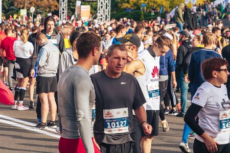 September 15, 2018 Minsk Belarus Half Marathon Minsk 2019 Many athletes leading a healthy lifestyle stand on the road before the start of the marathonのeditorial素材