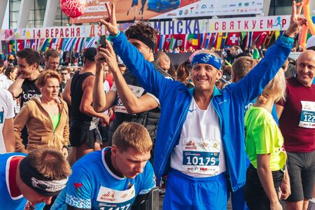 September 15, 2018 Minsk Belarus Half Marathon Minsk 2019 Happy athlete raised his hands up before the raceのeditorial素材