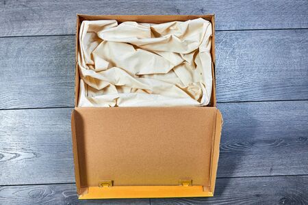 Box with white cloth inside for a pet or gift