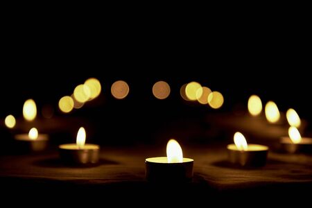 Burning memorial candles on the dark background Memorial Day International Holocaust Remembrance Day...