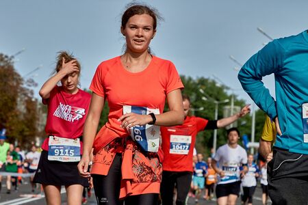 September 15, 2018 Minsk Belarus A participant girl of the Minsk half marathon 2019 Group of active...