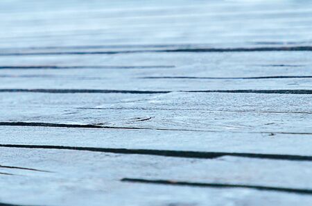 Flooring from painted boards. Background texture of old painted wooden boards.