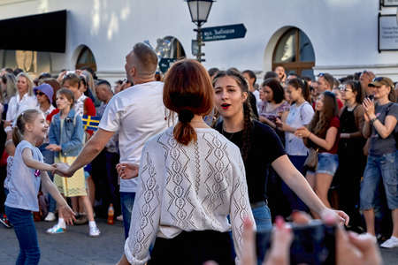 June 1, 2019 Minsk Belarus Teenage girls and parent with little girl dancing and enjoying the...