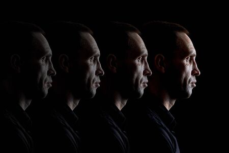 Duplicate portrait of a brutal person the concept of a repeating faceの写真素材