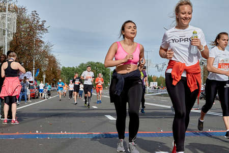 September 15, 2019 Minsk Belarus Half Marathon Minsk 2019 Cheerful women cross the finish line on an...