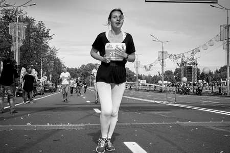 September 15, 2019 Minsk Belarus A marathon race in which a young woman crossed the finish line of a...