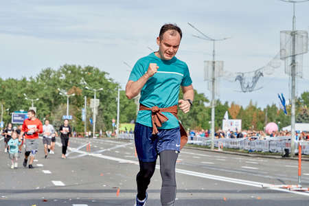 September 15, 2019 Minsk Belarus A marathon race in which a dedicated athlete runs a marathon close-upのeditorial素材