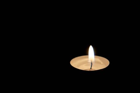 A candle are lit in memory of those who died from the coronavirus.The covid19 pandemic.21st century plagueの写真素材