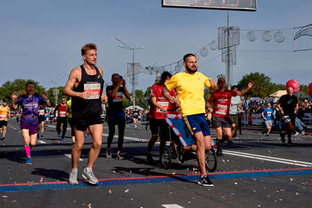 September 15, 2018 Minsk Belarus Half Marathon Minsk 2019 Athletes competitors run at the finish of the marathonのeditorial素材