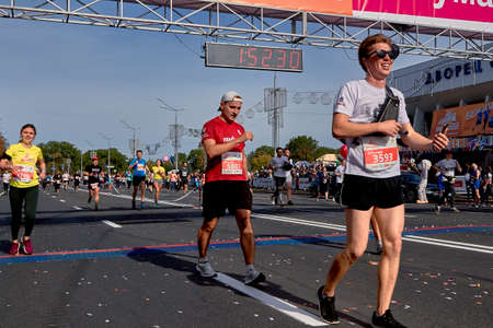 September 15, 2019 Minsk Belarus Half Marathon Minsk 2019 Runners cross the finish line marathon on paved roadのeditorial素材