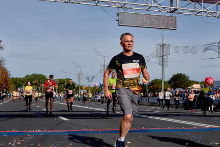 September 15, 2018 Minsk Belarus Half Marathon Minsk 2019 Athlete running marathon crossing the finish lineのeditorial素材