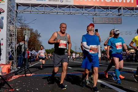 September 15, 2019 Minsk Belarus Group of unidentified people crossing the finish line in the...