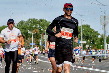 September 15, 2018 Minsk Belarus Half Marathon Minsk 2019 Happy athletes cross the finish line of...