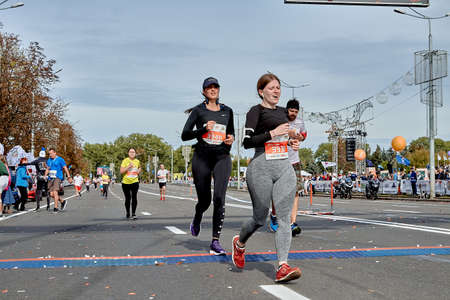 September 15, 2019 Minsk Belarus A marathon race in which participants cross the finish line on a city roadのeditorial素材