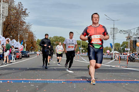 September 15, 2019 Minsk Belarus A marathon race in which an athlete crosses the finish line ahead of the participantsのeditorial素材