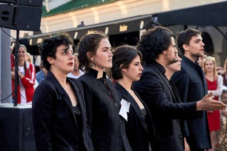 May 25, 2019 Minsk Belarus A group of young actors shows a performance on a city streetのeditorial素材