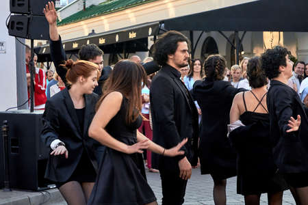 May 25, 2019 Minsk Belarus A crowd of actors dancing at a performance on a city streetのeditorial素材